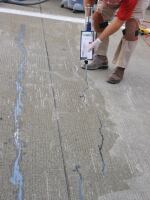 On some cracks or joints, doweling can be avoided altogether. This repair using Roadware Concrete Mender, a structural polyurethane, bonds the crack with microdoweling. This crack at the Cincinnati International Airport remains fully bonded today after six years of service. William D. Palmer Jr.