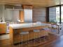 alex and ivan terry created a sense of continuity by bringing the ipe inside the house to rooms such as the kitchen/dining/living space.
