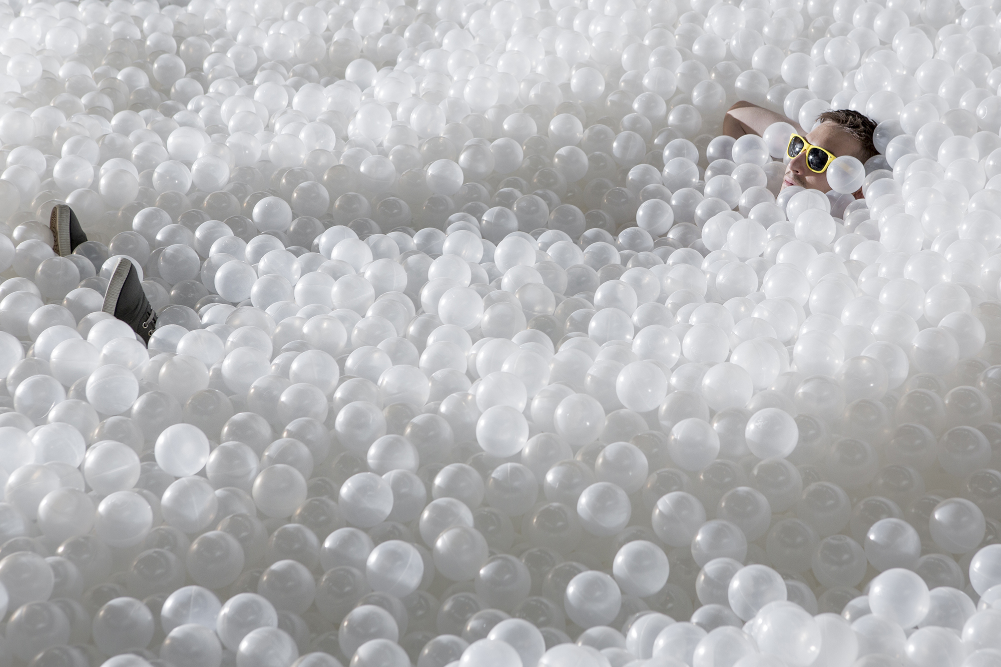 pink and white ball pit balls