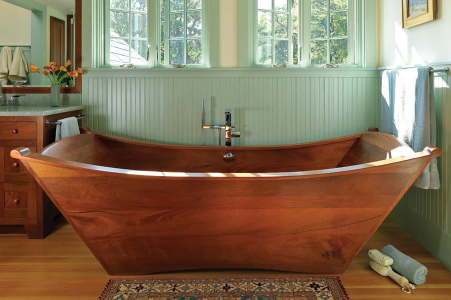The custom tub is the centerpiece of the bathroom in this Arts and