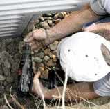 Then they secure step panels to each side with a pair of 2 1/2-inch coated deck screws.