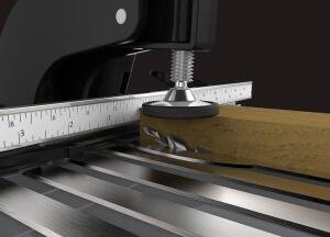 This cutaway shot shows how the bit comes up through the table when the lever is pulled.