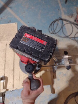 Seen here with the guide attachment, the router is well suited for accurate repeat mortises.