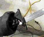 The blade clamp is tucked into the nose of the saw, so it's harder to get to than the clamps on other models.