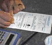 He uses a formula provided by the manufacturer to calculate the moisture vapor emission rate — or MVER — of the slab.