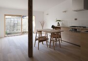 Kitchen and dining area with sliding glass door