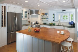 The client wanted a kitchen with a vintage feel that also fit with the ocean views of this Cape Cod vacation home.