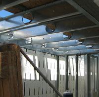 Structural and light-gauge steel framing complement the straight lines and efficiencies of the ICF walls; factory-built chases in the webs enable mechanical runs without extra framing, while also reducing mass, weight, and raw materials.