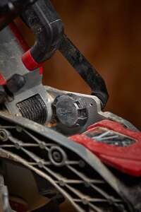 The Milwaukee TICK can be mounted to any tool, toolbox, or jobsite equipment with epoxy, rivets, screws, or zip ties. The tracker was intentionally designed with a flat back and low profile so that it can be mounted in inconspicuous places on tools and equipment. It's also light enough (.05 lb.) that it won't add any noticeable weight.