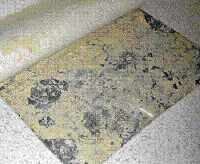 Excessive moisture can also increase the pH (alkalinity) level of concrete, causing flooring adhesives to fail, as it did under this vinyl.