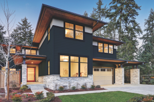 Everlast siding from Chelsea Building Products, made from a composite substrate called C CORE, is fused molecularly to a color-tinted acrylic capstock and embossed with an authentic cedar grain finish, producing durable, natural-looking siding.