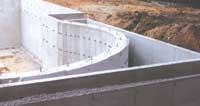 Reducing foundation wall thickness at the top to receive brick or stone veneers may require special reinforcement according to the new code.