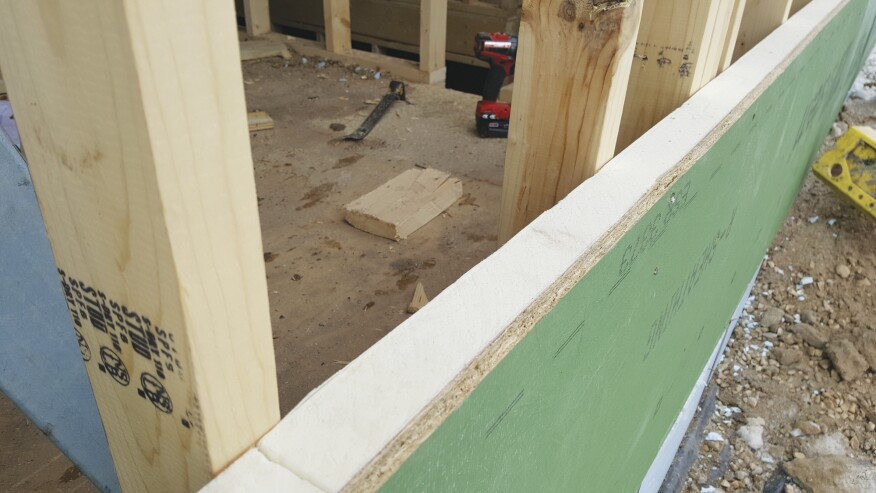 Continuous exterior insulation protects against thermal bridging at studs.