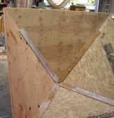 After the epoxy cured, the author glued solid lumber backers along the joints for added strength.