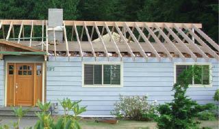 The new main roof was stick-framed over existing trusses.