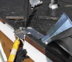Although some sheet metal can be reused, scuppers and drains should be replaced so the foam has a clean surface to bond to.