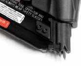 Since the nail that's about to be driven hangs out of the gun, aligning the shot is easy: You simply put the tip of the nail into the hole in the hardware.