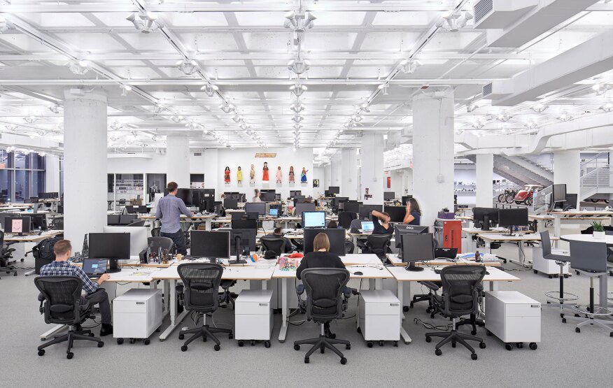 More than 10,000 lamps were bundled into groups of four individual sockets to create an industrial style fixture.