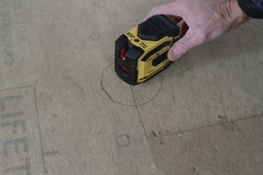 Use a small laser to project a dot on the ceiling to find the box location for the router plunge.