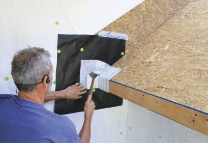Metal flashing protects the tape.