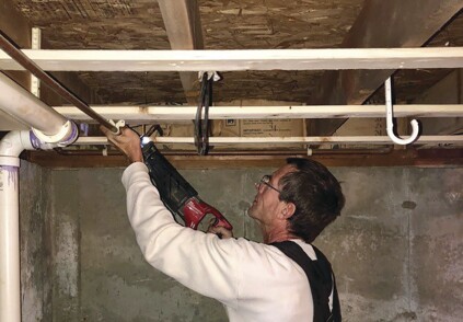 While not making as clean a cut as a tubing cutter, a recip saw can cut through pipe quickly. If the pipe happens to have water in it, the cordless version makes cutting much safer than with a corded saw.