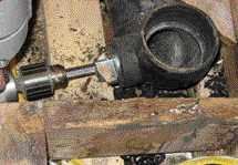 The end of the Pipe Shredder keeps the bit centered in the pipe. The bit has been inserted but the cutters have not yet engaged.