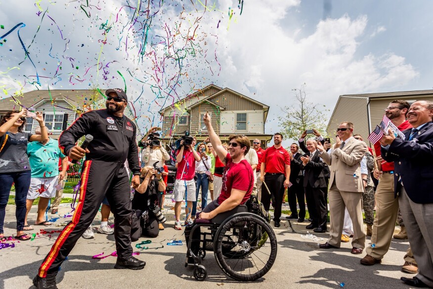 Built to Honor recipient U.S. Army Staff Sgt. Tim Payne is awarded a new mortgage-free home in Raleigh, N.C.