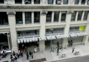 13th Street entry with cantilevered graphic identity canopy.