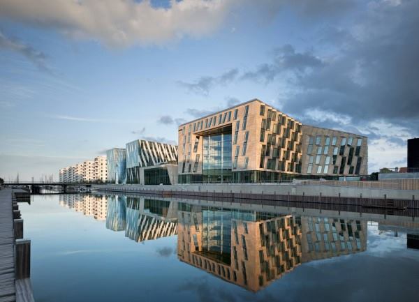 The performance and orientation of the travertine-topped insulated panels that clad 3XN's headquarters for Danish law firm Horten improve the building's performance and its indoor environmental quality.