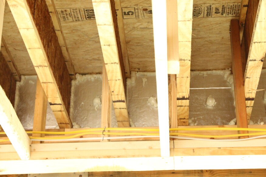 Rigid foam blocks sealed in place with expanding foam sealant effectively air seal the rim joist.