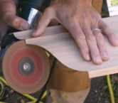 Then finishes with 50-grit paper, which leaves a smoother edge.