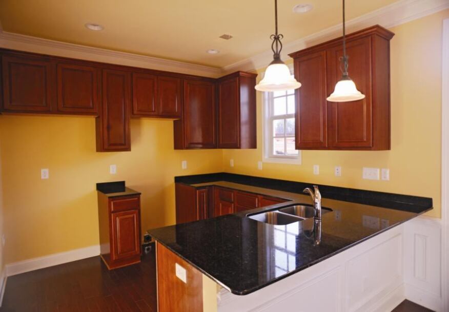 Precision Pay-off: Panelization allows Meeting Street to order countertops and cabinets without measuring because there’s no variation in the walls.
