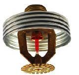 Heads automatically activate when the air surrounding them reaches a predetermined temperature — typically between 155°F and 175°F. The glass bulb in the sprinkler at left contains a liquid that expands when heated. At the critical temperature, the pressure breaks the bulb and releases the water.