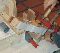 Provide rugged clamping points for twisting the rail into a spiral.