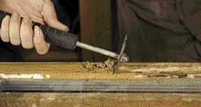 After a minute or so, both materials release their grip on the wood and can be quickly scraped off.