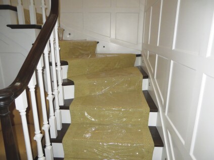 Carpeted stairs can be covered with adhesive plastic.