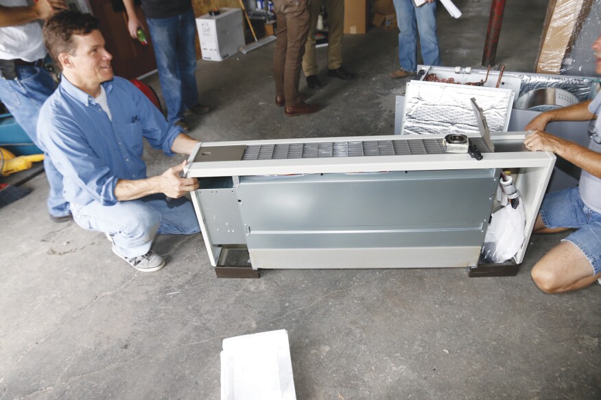 The author examines a Mitsubishi PFFY compact air handler. This small unit is useful for handling the heating and cooling requirements of peripheral zones in a building and can be one of multiple air-handling units connected to the same outdoor VRF compressor.