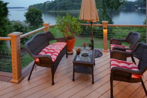 When taking photos of your deck projects, stage it with furnishings and props to help invite viewers to emotionally ‘enter’ the scene.