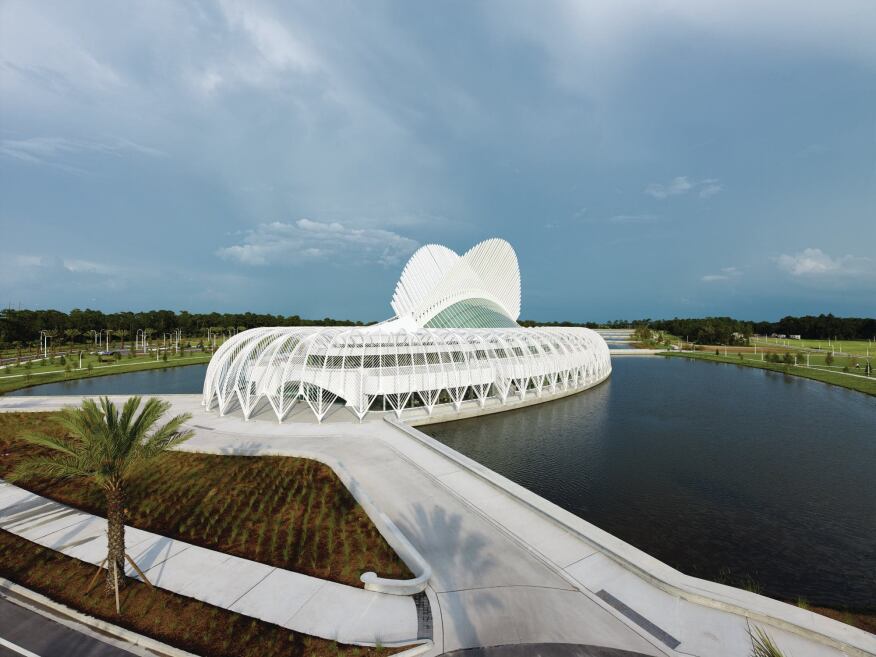 The IST marks one end of a linear lake, which will eventually be developed with further academic and dormitory buildings. 