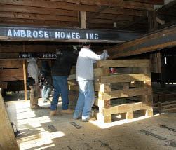 To fill in the gaps, the crew repositioned the cribbing above and below a completed floor section.