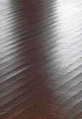 Certain types of hardwood flooring — including parquet, bamboo, and some engineered products — can be successfully installed on above-grade slabs, but only if the concrete is sufficiently dry. Slab moisture can cause flooring to cup.