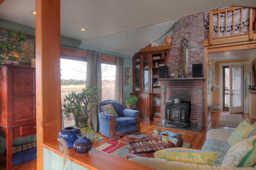A gas-fired fireplace insert provided the principle source of heat for the west portion of the cottage.