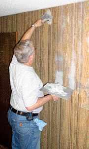 When skim-coating, the author uses the narrowest taping knife possible that will allow him to completely fill the grooves without applying excess material.