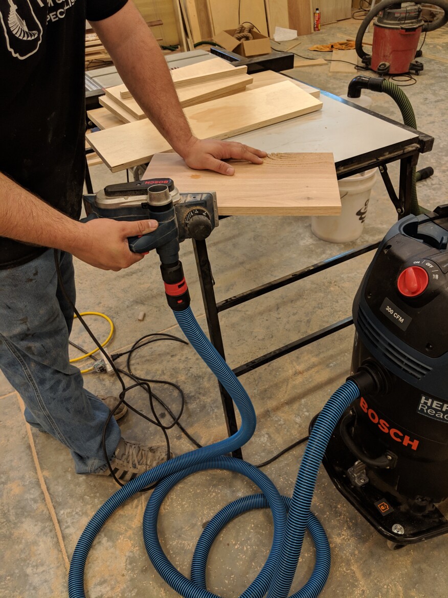 No matter what tool the author used the extractor with—a big chip maker like the planer here or a fine-dust creator like a sander—the auto-clean function kept the filters nearly spotless.