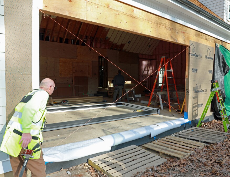 String lines run diagonally from corner to corner verify that the wall plane is flat.
