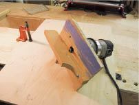A dedicated router is set up to cut 1/4-inch-by-3/4-inch rabbets for carcase corner joints.