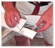 He glues the lap with fast-setting PVC cement.