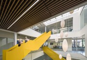 As Okland’s logo is yellow the color was used sparingly, apart from the main circulation stair where concrete risers are enclosed in lacquered yellow steel, indicative of construction vehicles.
