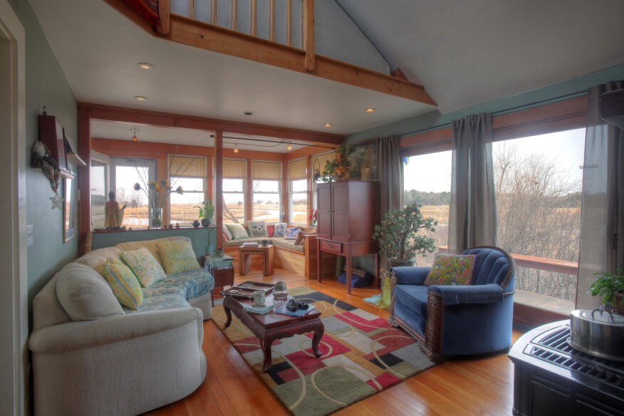 Perched on the edge of a Cape Cod salt marsh, this cottage of less than 800 square feet enjoys peaceful panoramic views. The location makes the cottage an attractive destination for downsizing.