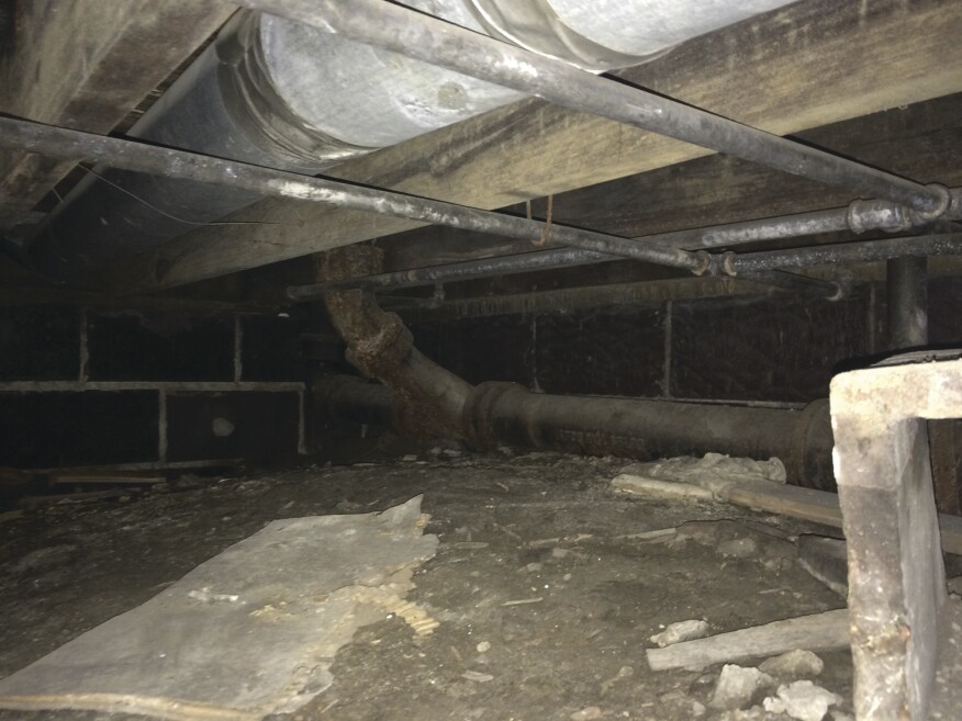 The dirt crawlspace created a huge moisture load for the interior.